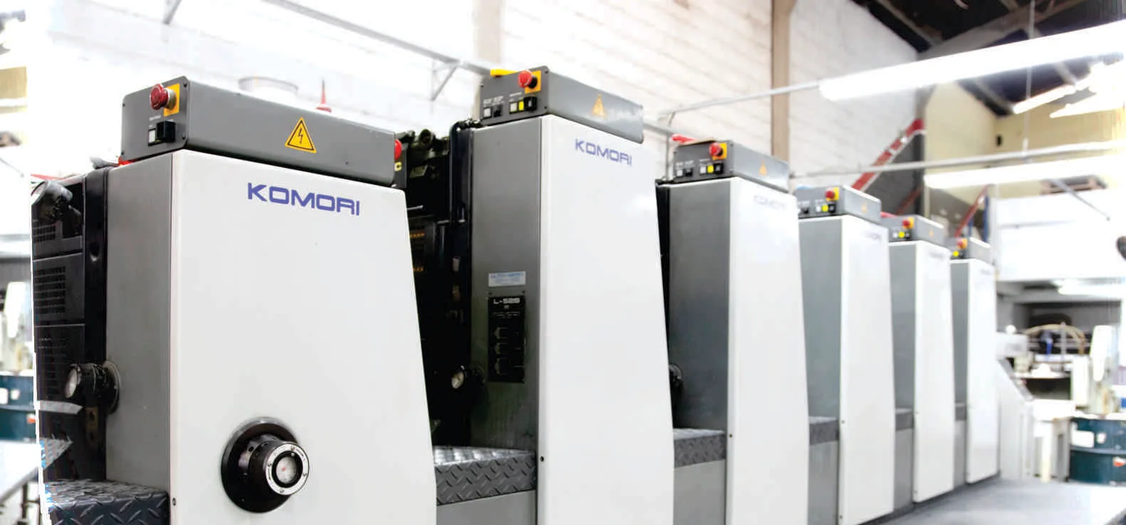 Impressora offset Komori no parque gráfico da Laser Art